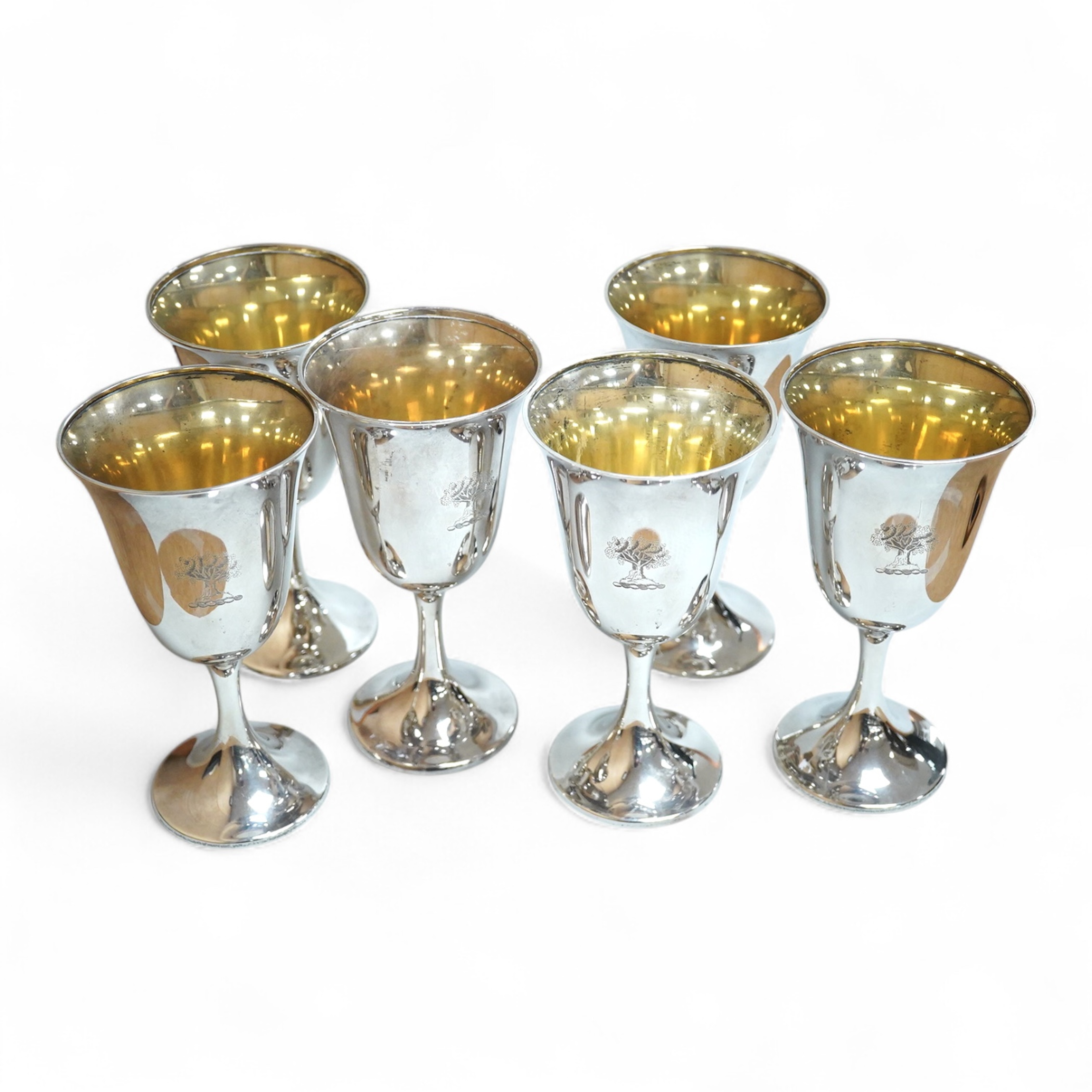 A matched set of six early 20th century North American sterling goblets, four by Gorham, date code for 1927, all with engraved crest, height 16.6cm, 27.3oz.